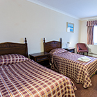 The Harrowgate Hill Lodge Twin Bedroom image